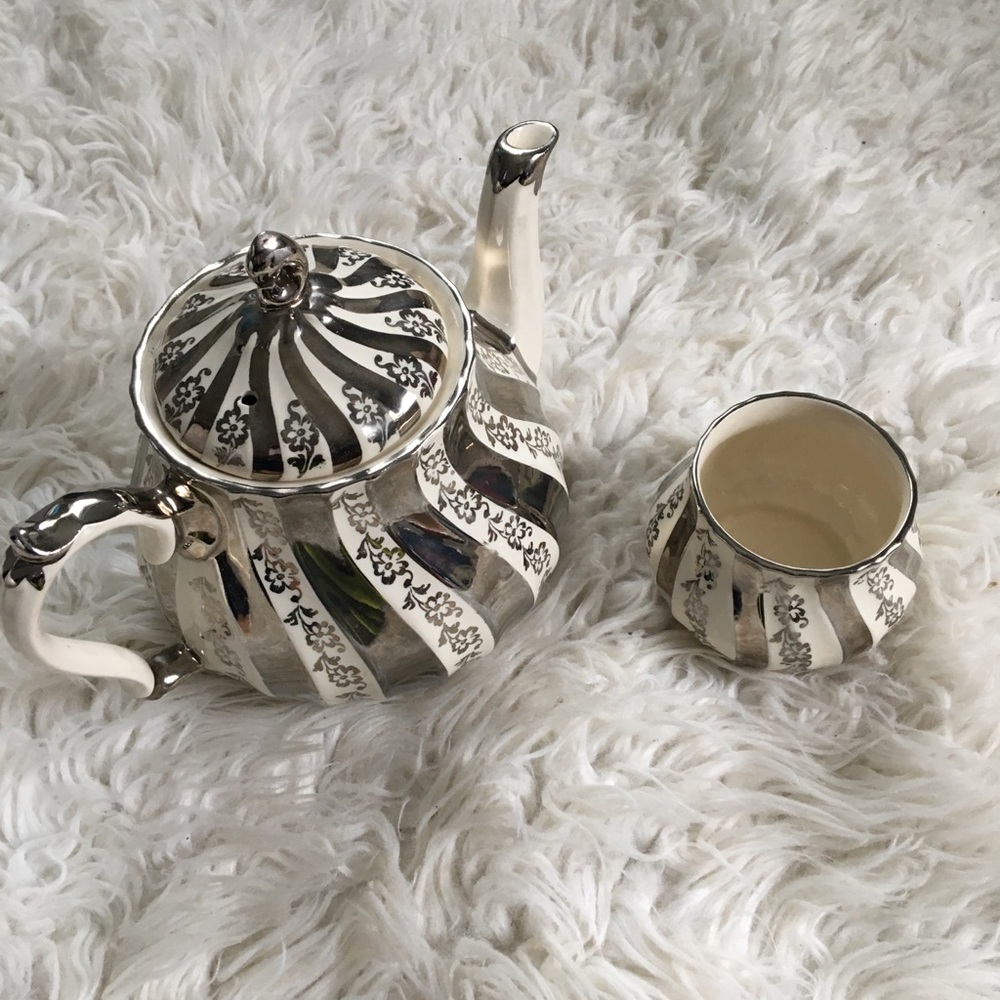 SILVER TEAPOT and CUP